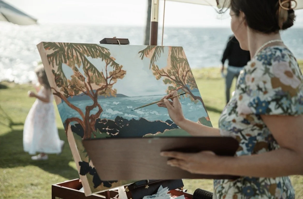Live wedding painting in progress at a Maui venue